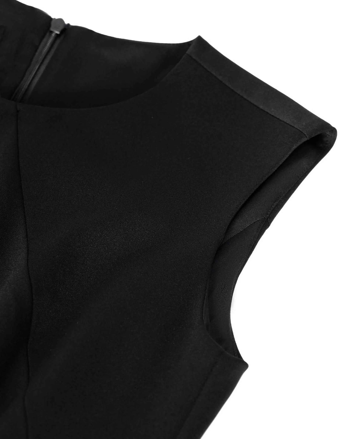 The upper section follows a clean curve around the arm opening beside a plain neckline.