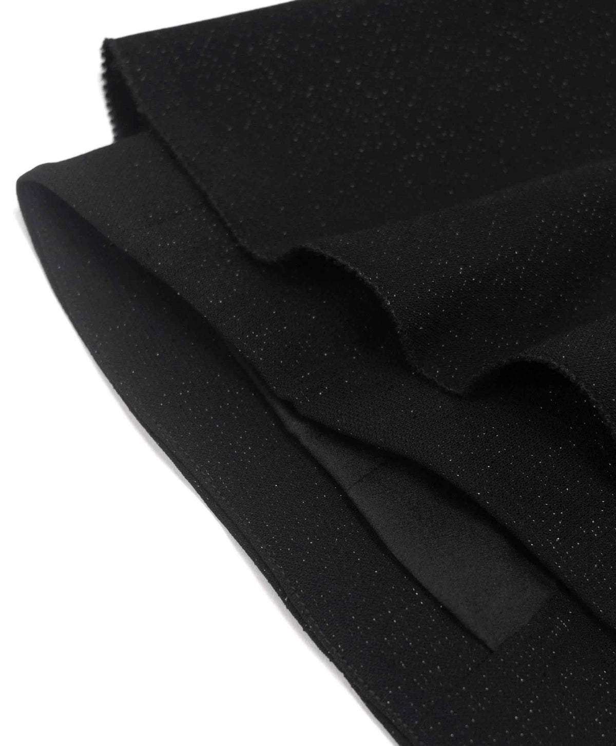 The sleeve detail shows overlapping edges and a plain dark finish.