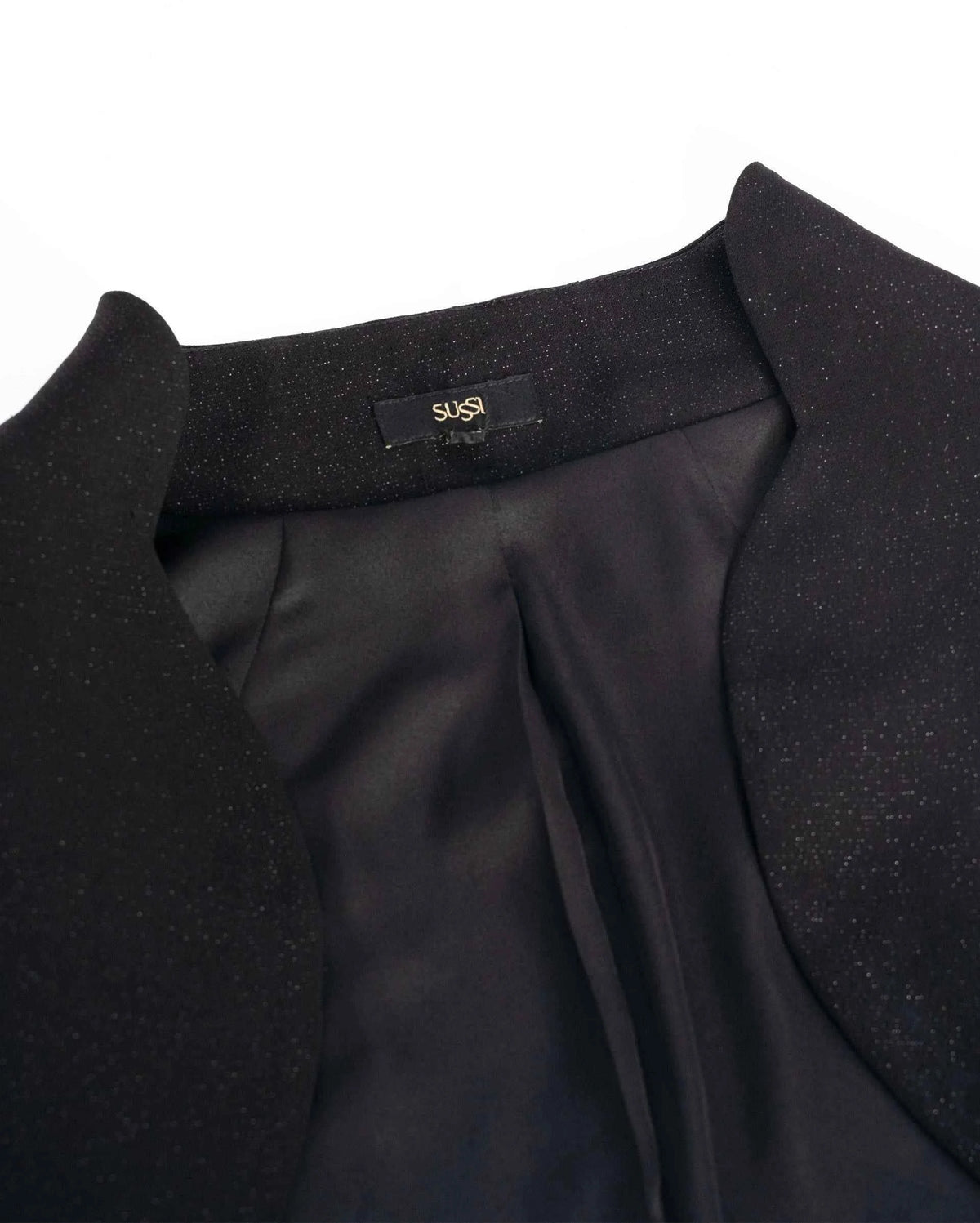 The collar and front edge create a clear angular frame above the smooth inner surface.