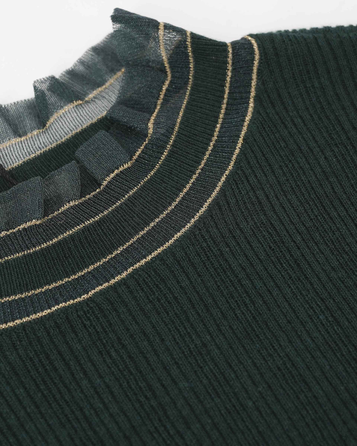 Slender gold-toned lines circle the deep green neckline beneath a sheer ruffled edge.