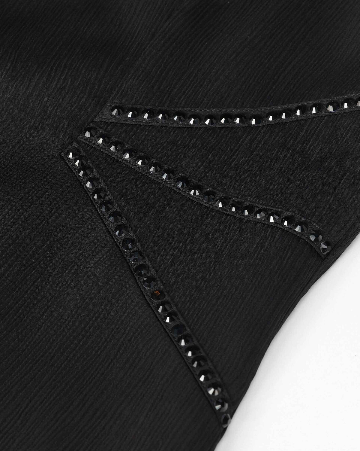 A narrow line of small decorative accents follows the lapel edge.
