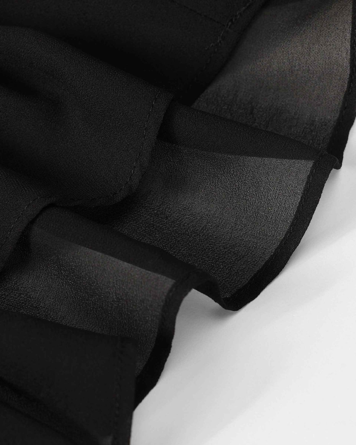 A transparent border extends below the darker skirt, tracing the shape of the flared hem.