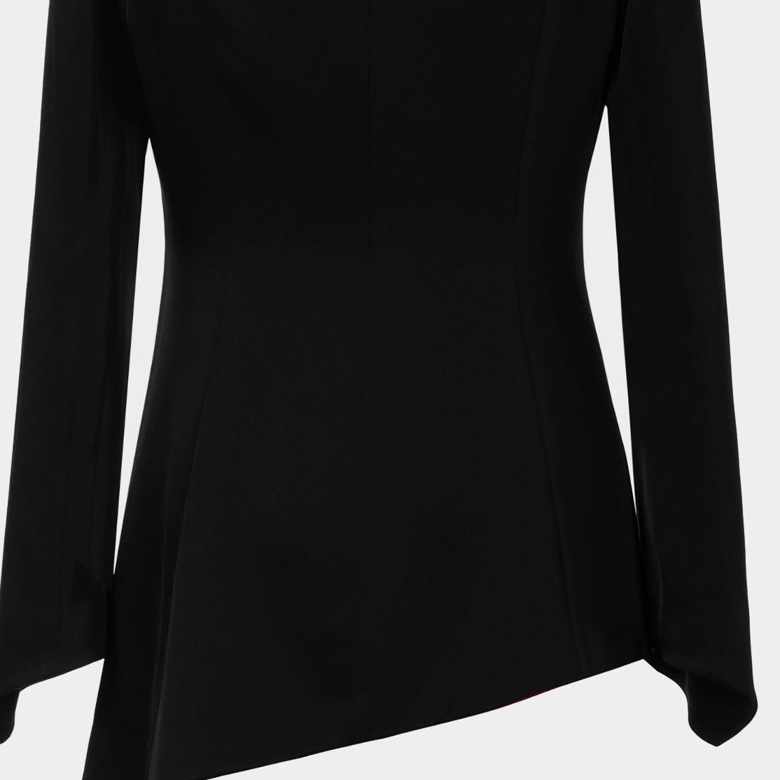 The back view reveals a shaped waist and an angled lower edge.