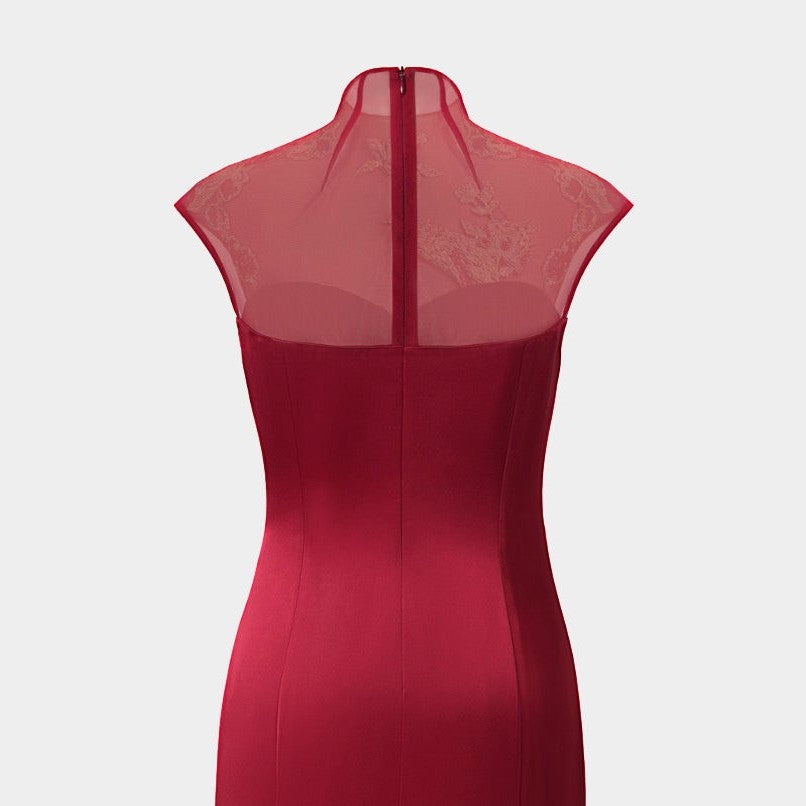The upper back pairs a sheer red panel with the darker body below.