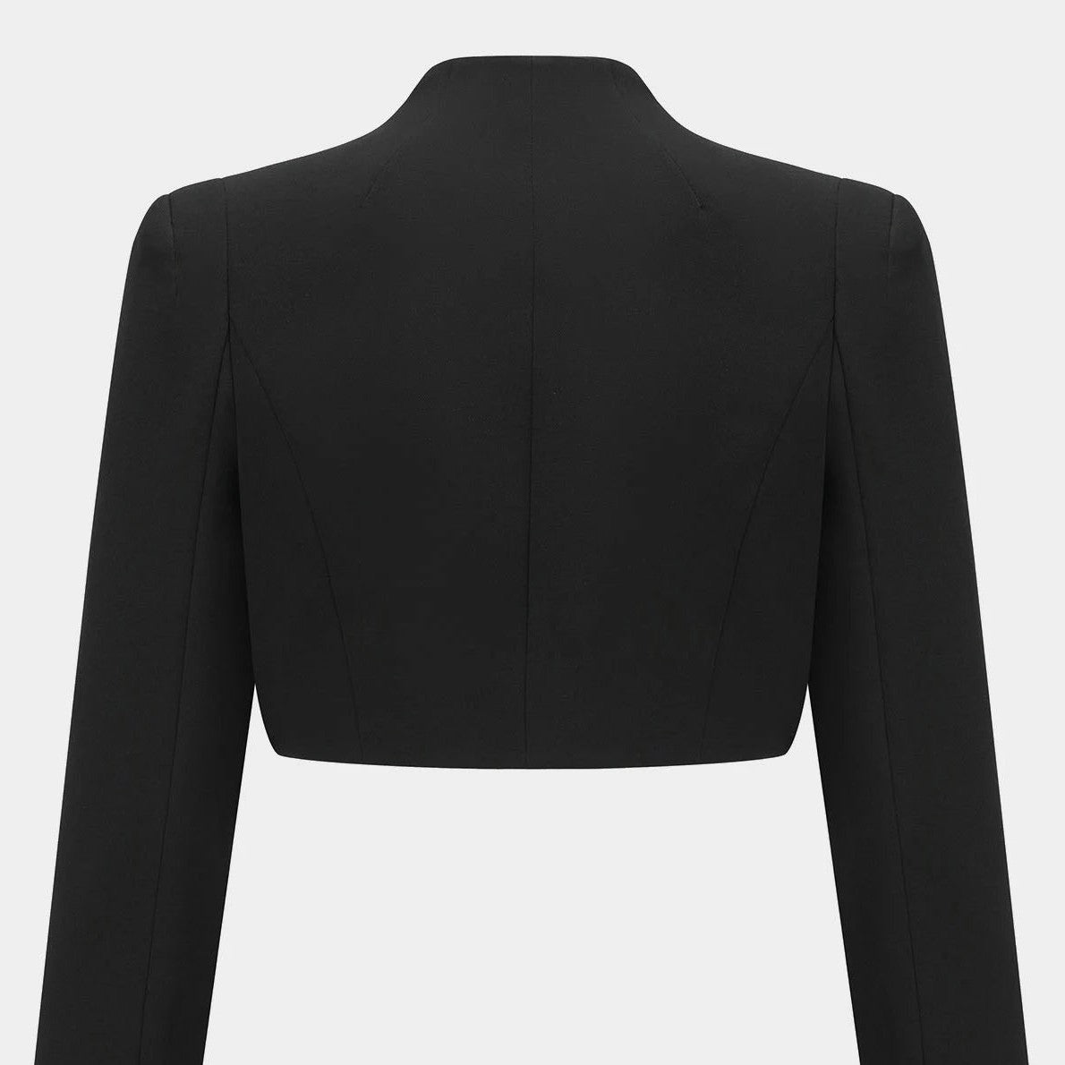 The back finishes above the waist, creating a short horizontal line beneath the shoulders.